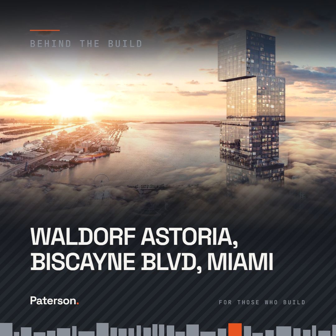 Behind the Build graphic: Waldorf Astoria, Biscayne Boulevard, Miami. The tower's offset glass volumes rising above Biscayne Bay at sunrise